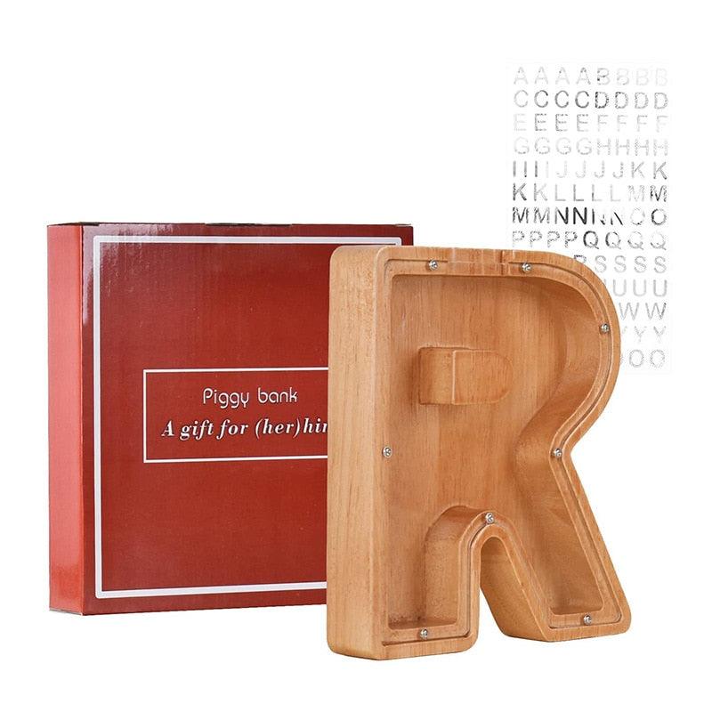 Tirelire en forme de lettre et en bois - Stockmania