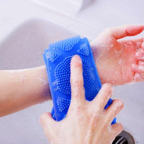 Brosse de douche exfoliante en silicone